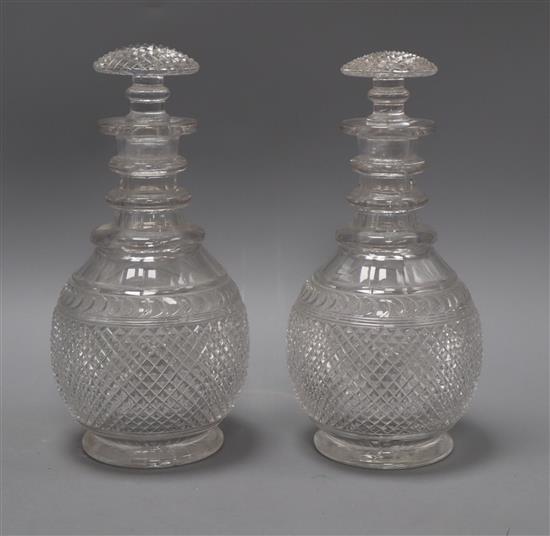 A pair of Victorian cut glass decanters height 26cm